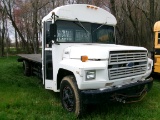 1986 FORD B700 BUS, DSL ENG, AUTO TRANS, AIR BRAKES, 22’ STEEL BED