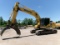 2017 KOMATSU PC210 LC SELLS WITH GRAPPLE. 31 1/2