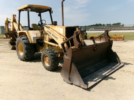 JD 410B BACKHOE, 4X4, DSL, 4 POSTS CANOPY, 4 IN 1 BUCKET WITH FOLD DOWN FOR