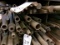 ROW OF METAL STOCK, ASST FLAT, ROUND, ANGLED