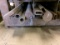 ROW OF METAL STOCK, ASST FLAT, ROUND, ANGLED