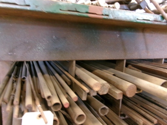 ROW OF METAL STOCK, ASST FLAT, ROUND, ANGLED