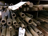 ROW OF METAL STOCK, ASST FLAT, ROUND, ANGLED