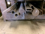 ROW OF METAL STOCK, ASST FLAT, ROUND, ANGLED