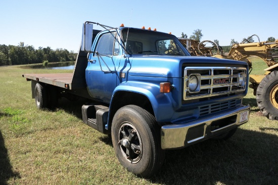 1983 GMC 7000 W/ BIG BLOCK GAS ENG, 19' 6" STEEL BED, 5 SPD TRANS W/ 2 SPD,   124,552 MILES, NEW RUB