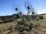 JD 702 8 WHEEL V-RAKE