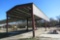 BUTLER 60' X 24' X 18' TALL STEEL SHELTER, OPEN ENDS & WALLS, 6' SHEETED FROM THE TOP, 15' EXTENSION