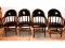 4 Black Vinyl Captains Chairs with Nail Head Trim