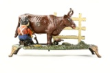 J & E Stevens Co Milking Cow CI Mechanical Bank