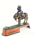 J & E Stevens Co Mule Jockey CI Mechanical Bank