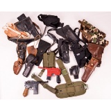 Large Group of Holsters and LaRami Toy Pistols