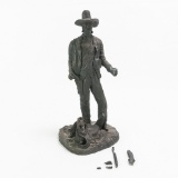 Ed Reilly Cowboy With Saddle Bronze Statue