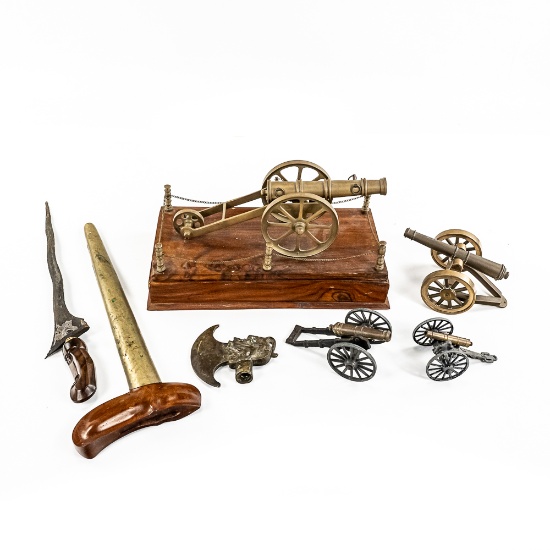 A Battery of Brass Cannons and Blades