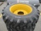 NEW (4) 10-16.5 Skid Steer Tires on New Holland Wheels