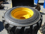 New (4)12-16.5 Skid Steer Tires on New Holland Wheels