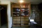 Two Cupboards With 3 Shelves And 6 Drawers of Clothing Approximately 102 Pieces Plus 1 Hat