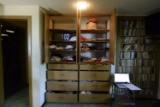 Two Cupboards With 3 Shelves And 6 Drawers of Clothing Approximately 102 Pieces Plus 1 Hat