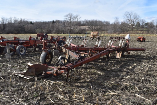 IH 710 4-btm + (1) add-on onland semi mount plow