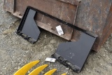 Skid loader quick hitch