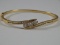 14 Karat Yellow Gold 2.40 CTW Chanel Set Bypass Bangle Bracelet