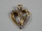 10 Karat Yellow Gold Round & Bagguette Diamond Heart Pendant