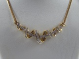 14 Karat Yellow Gold 1 CTW Bagguette & Round Diamond Swirl Necklace