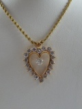 14 Karat Yellow Gold 2.5 CTW Diamond Heart Pendant on 14k Gold rope chain
