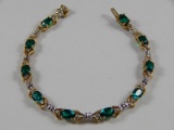 10 Karat Yellow Gold Emerald & Diamond Tennis Bracelet