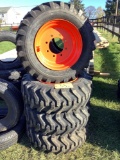 NEW Set of 4 10-16.5 Tires om Bobcat Rims