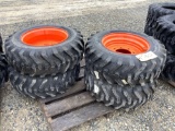 Set of 4 Skid Loader Tires on Wheels 10-16.5 Orange