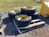 10-16.5 Tires on CAT Yellow Wheels