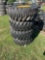 12-16.5 Skid Loader tires on wheels (CAT)