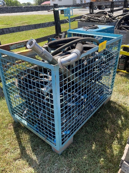Metal crate of hyd hoses