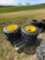 Set of 4 - 12-16.5 Skid Loader tires on wheels - NH/JD