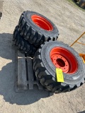 Set of 4 12-16.5 Skid Loader Tires on. Wheels, Bobcat