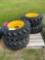 Set of 4 - 12-16.5 Skid Loader Tires on Wheels (NH/JD/CAT)