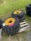 Set of 4 - 10-16.5 Skid Loader Tires on Wheels (NH/JD/CAT)