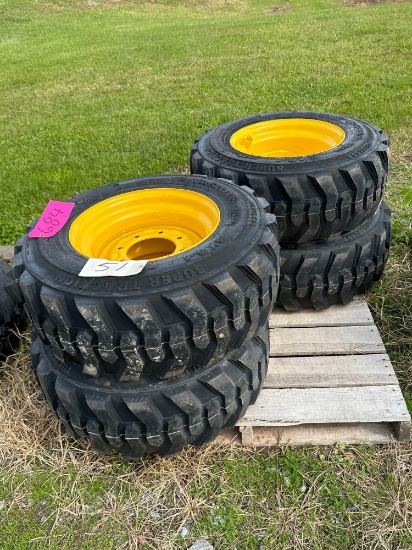 Set of 4 - 12-16.5 Skid Loader Tires on Wheels (NH/JD/CAT)