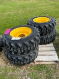Set of 4 - 12-16.5 Skid Loader Tires on Wheels (NH/JD/CAT)