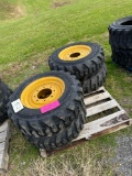 Set of 4 - 10-16.5 Skid Loader Tires on Wheels (NH/JD/CAT)