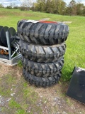 Set of 4 10-16.5 Skid Loader Tires on Bobcat Wheels