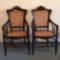 Pair of Antique Ornately Carved Walnut Cane Bottom Captains Chairs