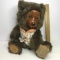 1988 Robert Raikes Bear with Wooden Face & Feet wearing a Vest & Glasses