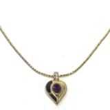 Pretty Christian Dior Signed Gold tone heart Pendant with Purple Stone on Gold Tone Chain