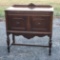 Antique Wooden Small Cabinet Buffet w/Carved Appliqué & Stretcher Base by Ebert Furniture Company