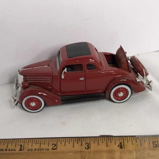 1936 Ford Deluxe 5-Window Coupe Die-Cast Car by Ford Motor Co.