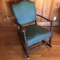 Vintage Dark Wood Rocking Chair with Teal Upholstered Back & Seat