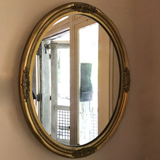 Vintage Oval Mirror with Ornate Gilt Frame Made of Heavy Molded Plastic
