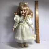 Porcelain Doll with Blonde Hair & Blue Eyes on Stand