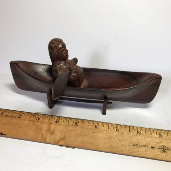 Hand Carved Wooden Native in Canoe on Stand
